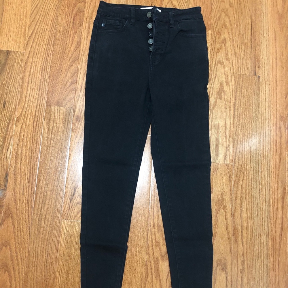 Skinny button fly distressed hem jeans